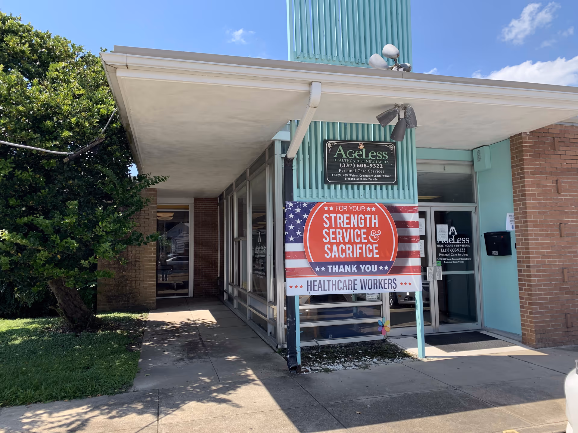 Exterior view of Ageless Healthcare building with a banner thanking healthcare workers.