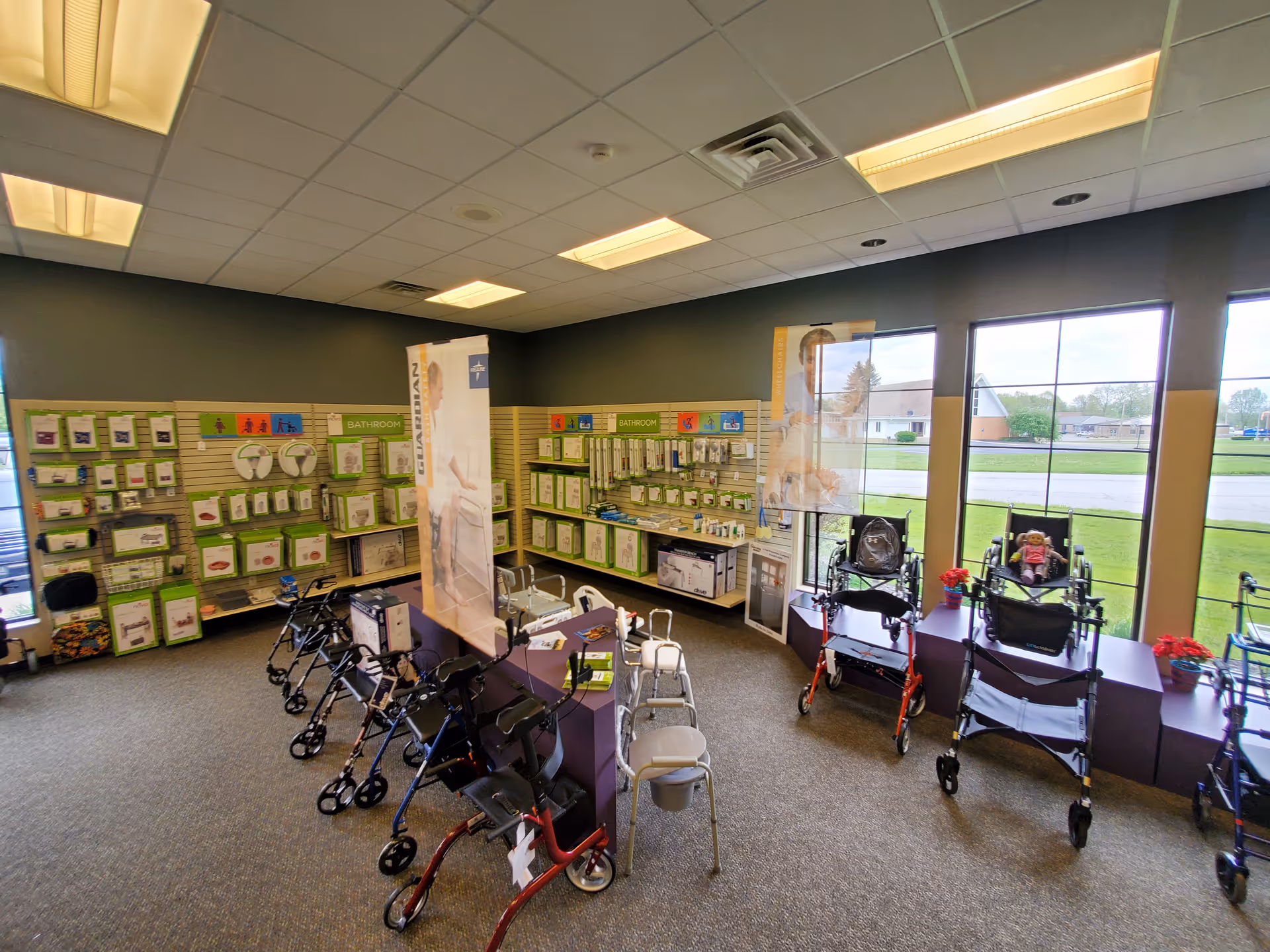 Interior showroom in a senior living facility with wheelchairs, walkers, and medical supplies.
