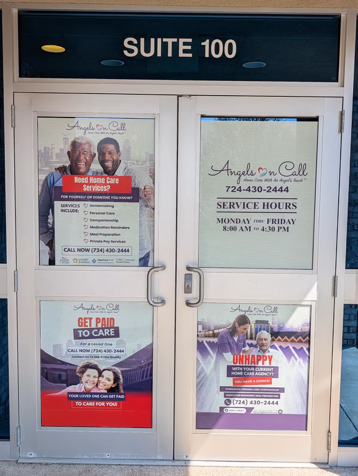 Double glass doors show Angels On Call posters and Suite 100 above.