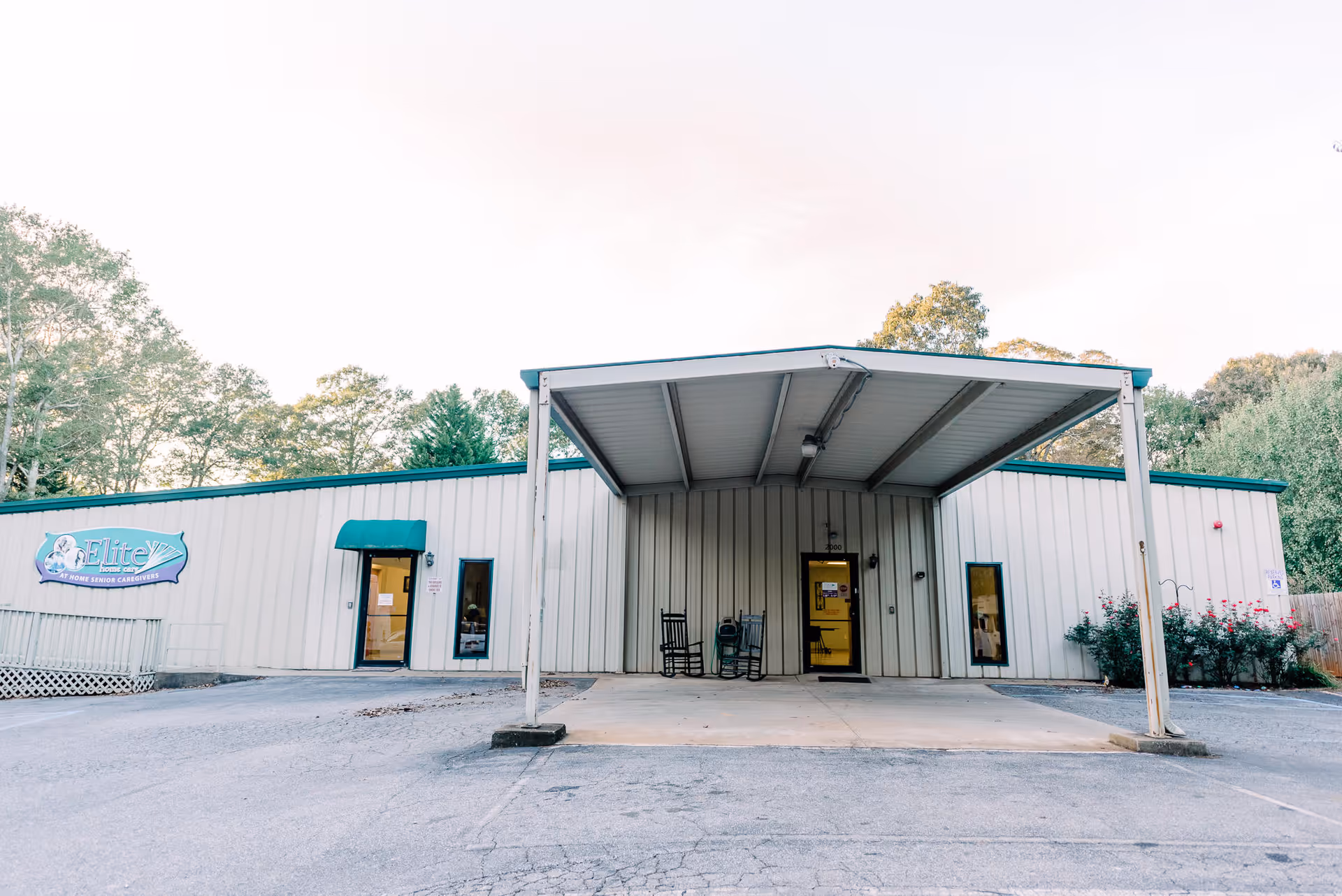 Exterior view of Elite Home Care and Day Centers building with a covered entrance
