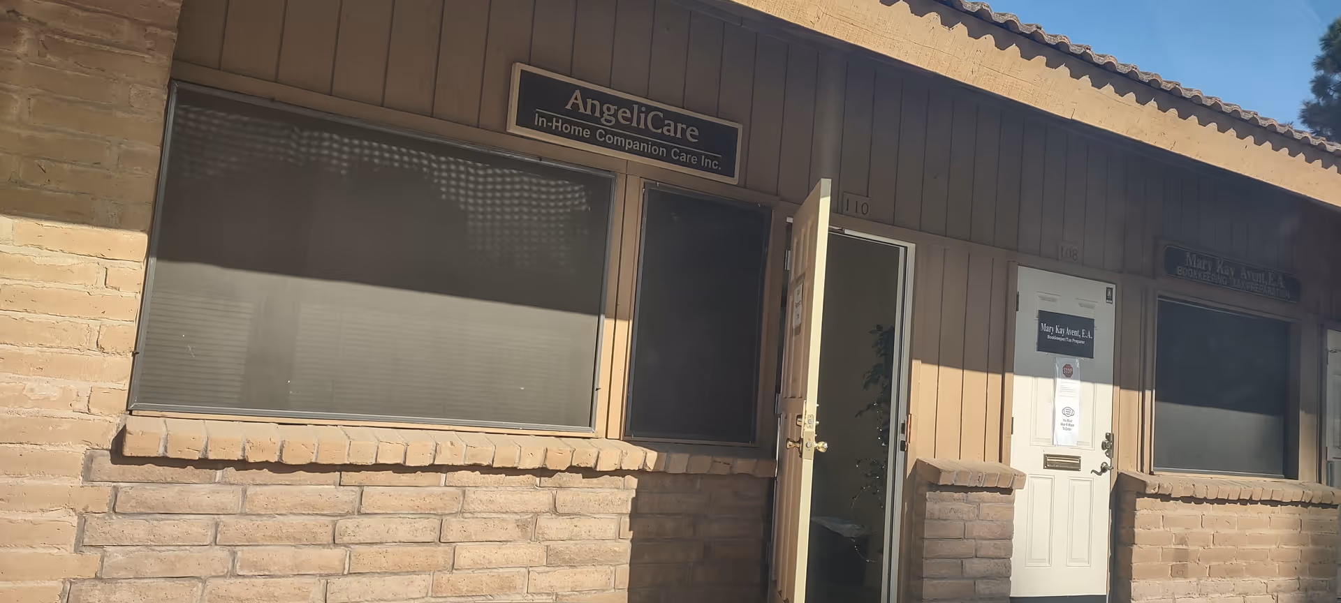 Exterior view of Angelicare In-Home Companion Care facility with brick exterior.