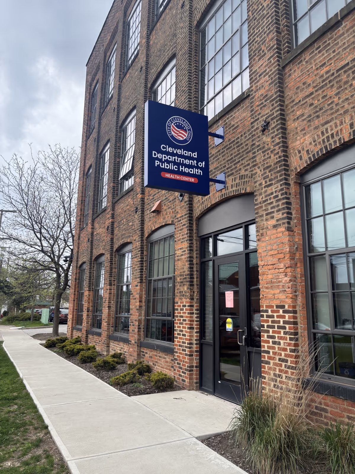Brick building exterior with Cleveland Department of Public Health Health Center sign.