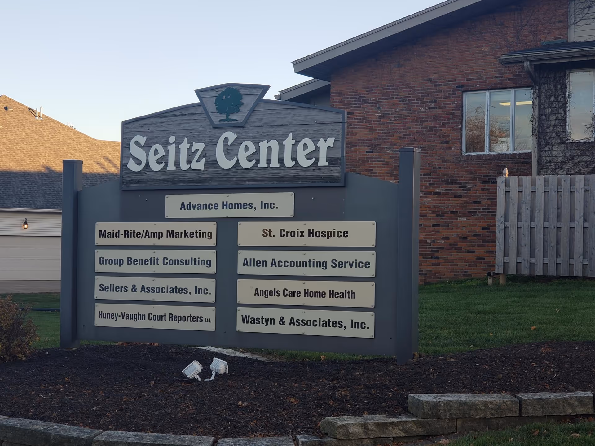 Outdoor Seitz Center sign listing tenants, including St. Croix Hospice.