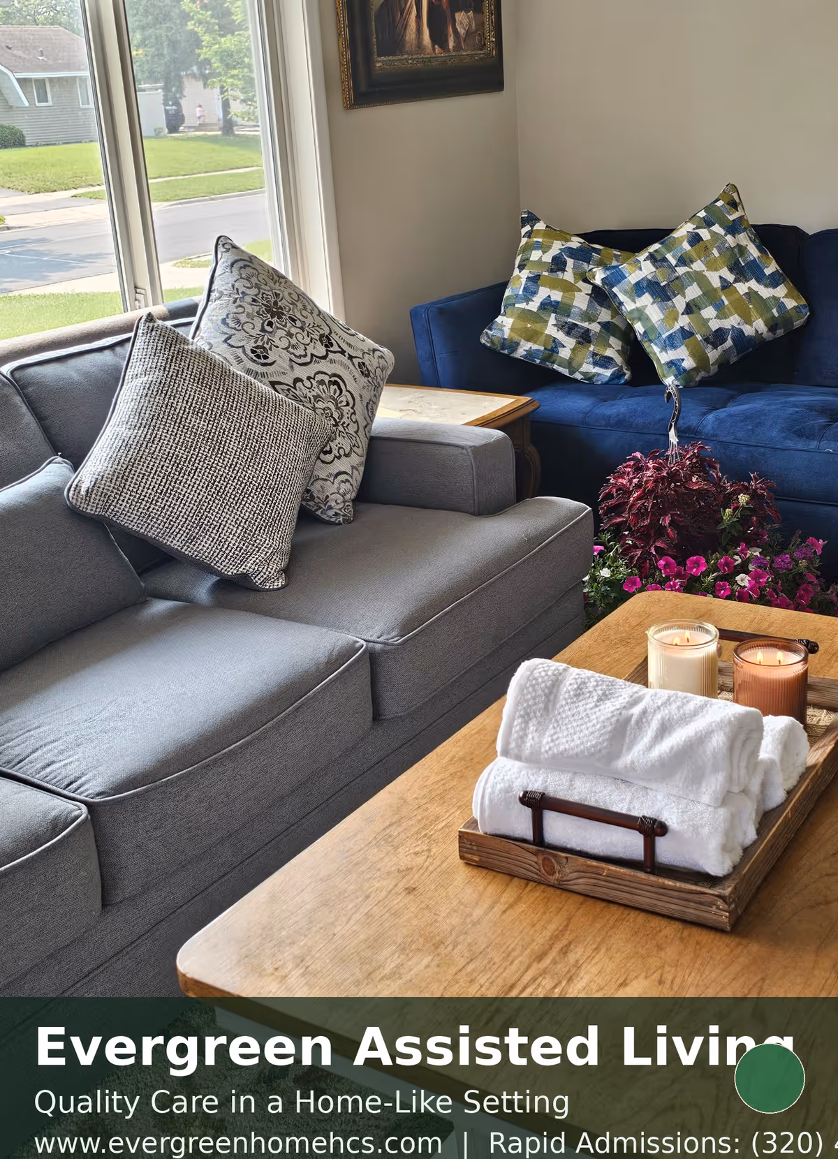 Cozy living room with gray sectional, colorful cushions, coffee table, and candles.