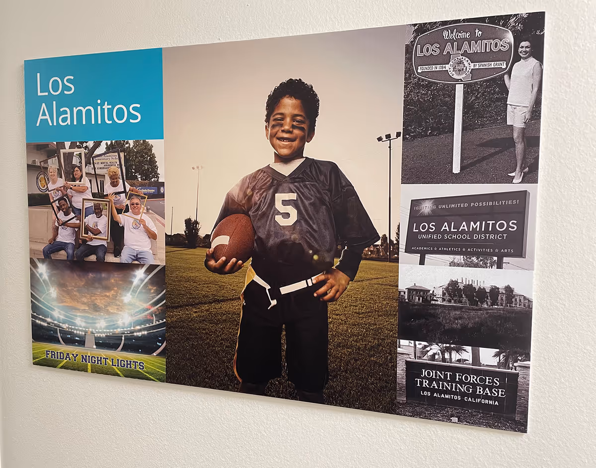 Decorative wall art poster collage featuring Los Alamitos with a smiling child in football gear.