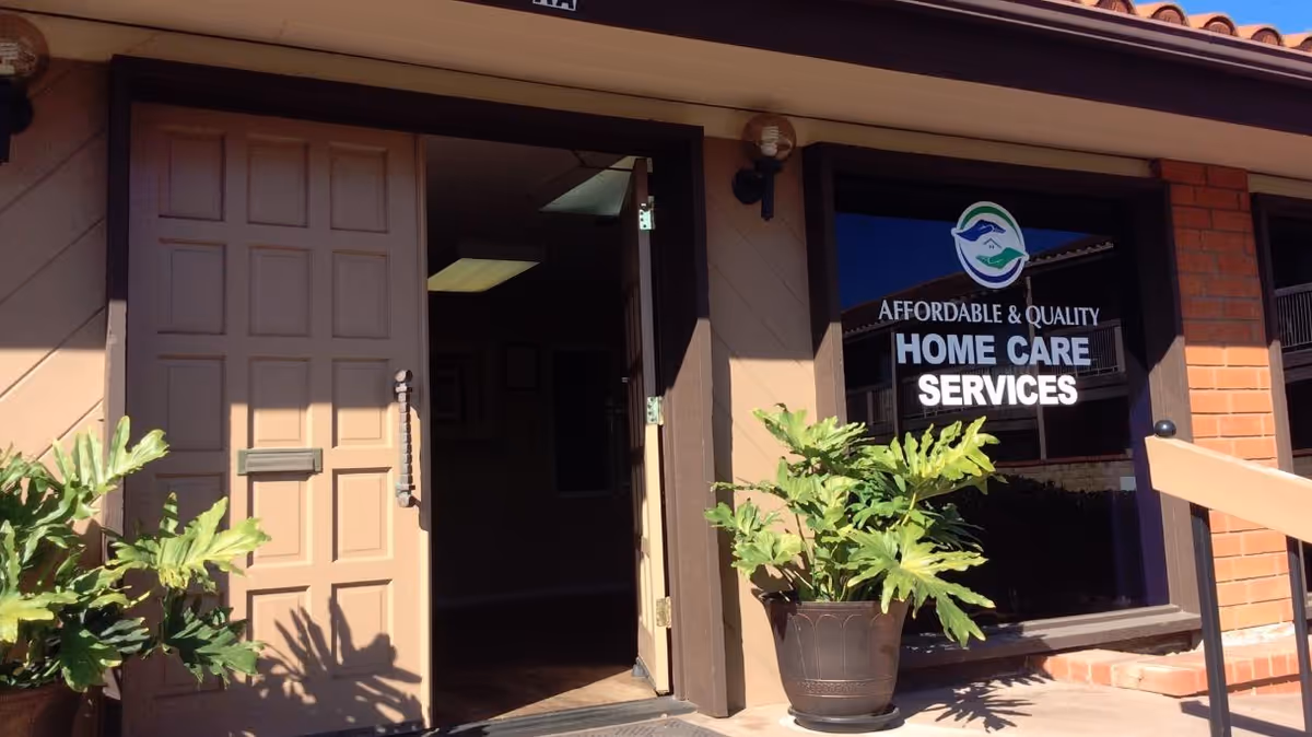 Open doorway to a building front with a sign reading Affordable and Quality Home Care Services.