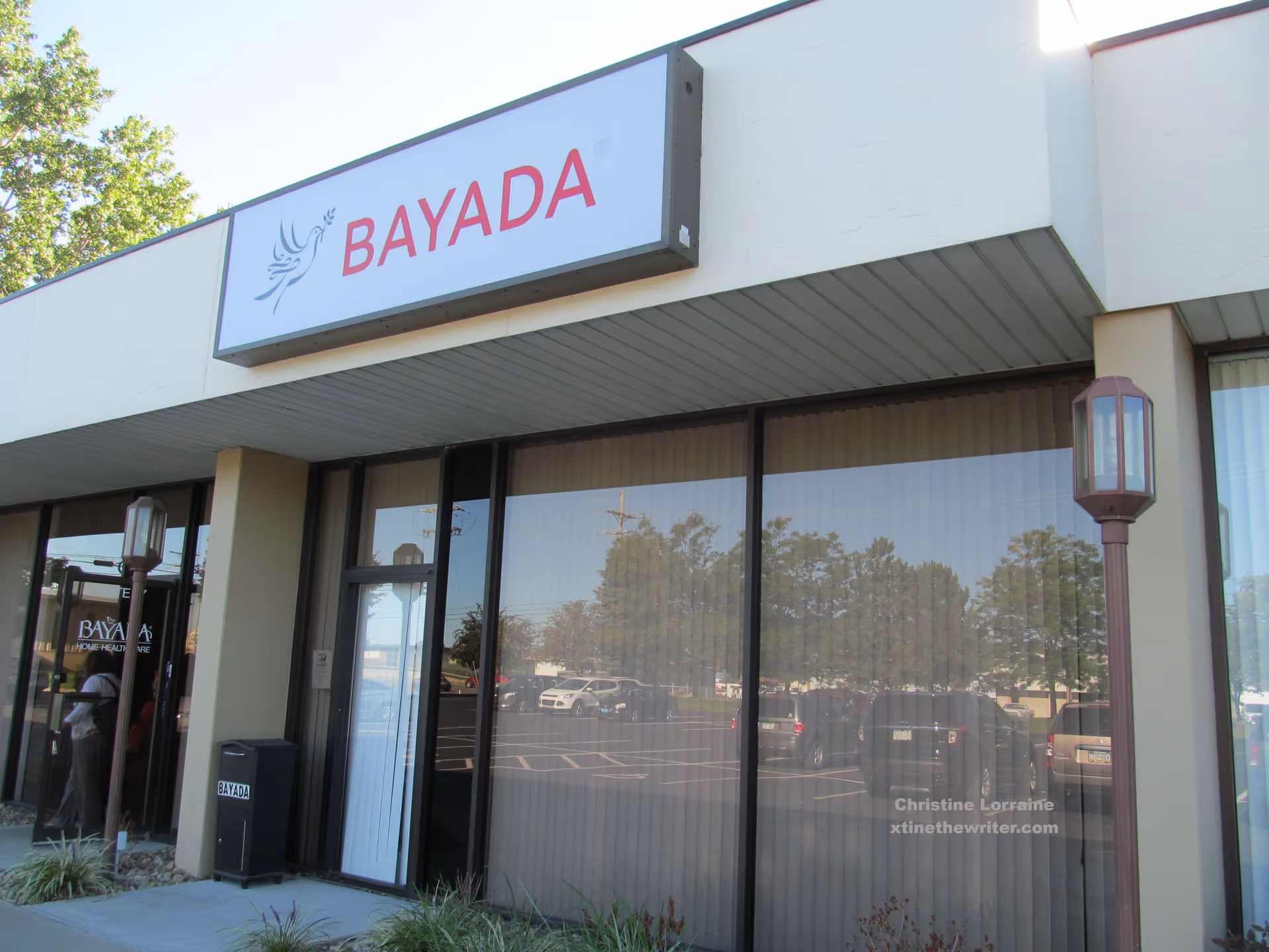 Exterior view of a BAYADA Pediatrics building with a large glass storefront.