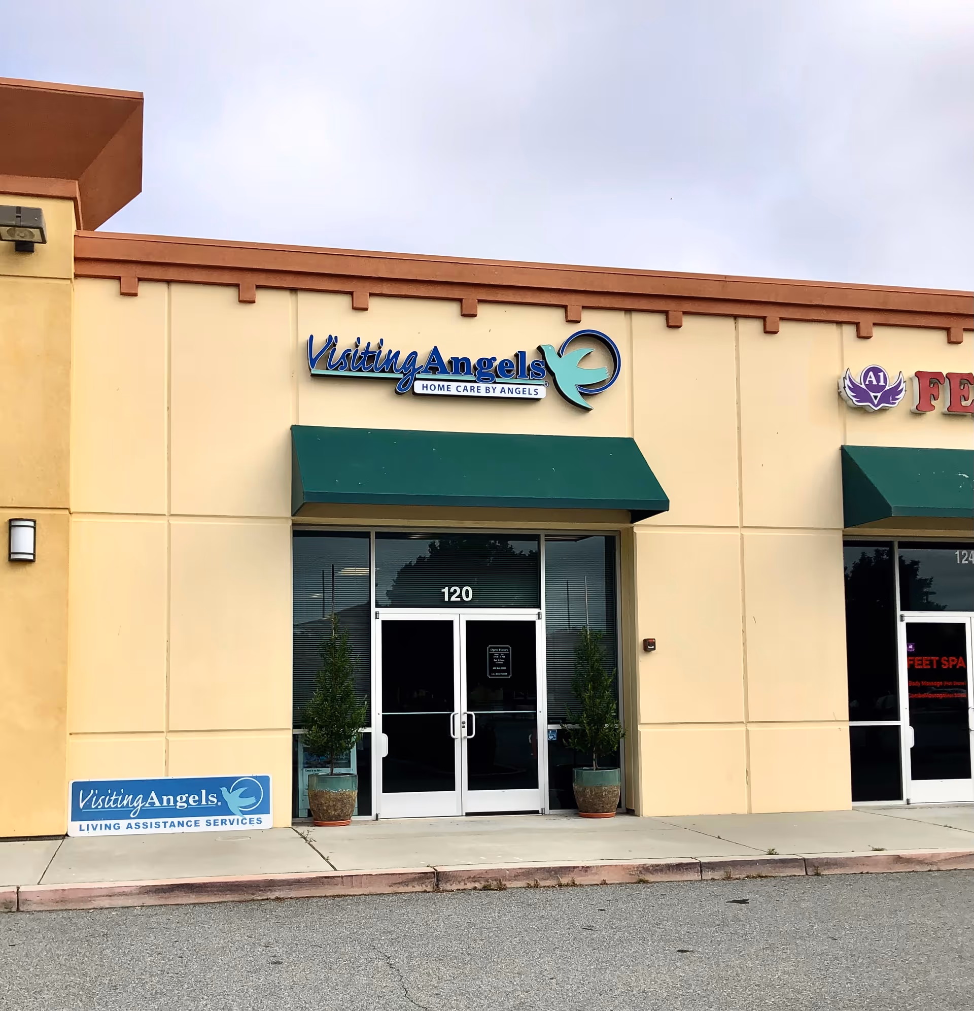 Front entrance of Visiting Angels senior home care facility with signage