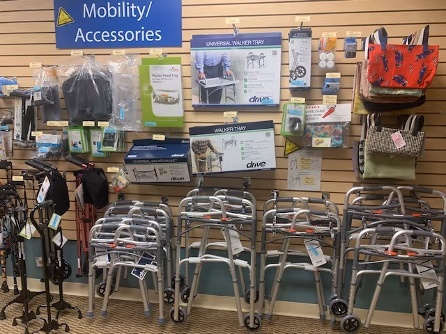 Interior display wall showing walkers and mobility accessories in a senior care facility.