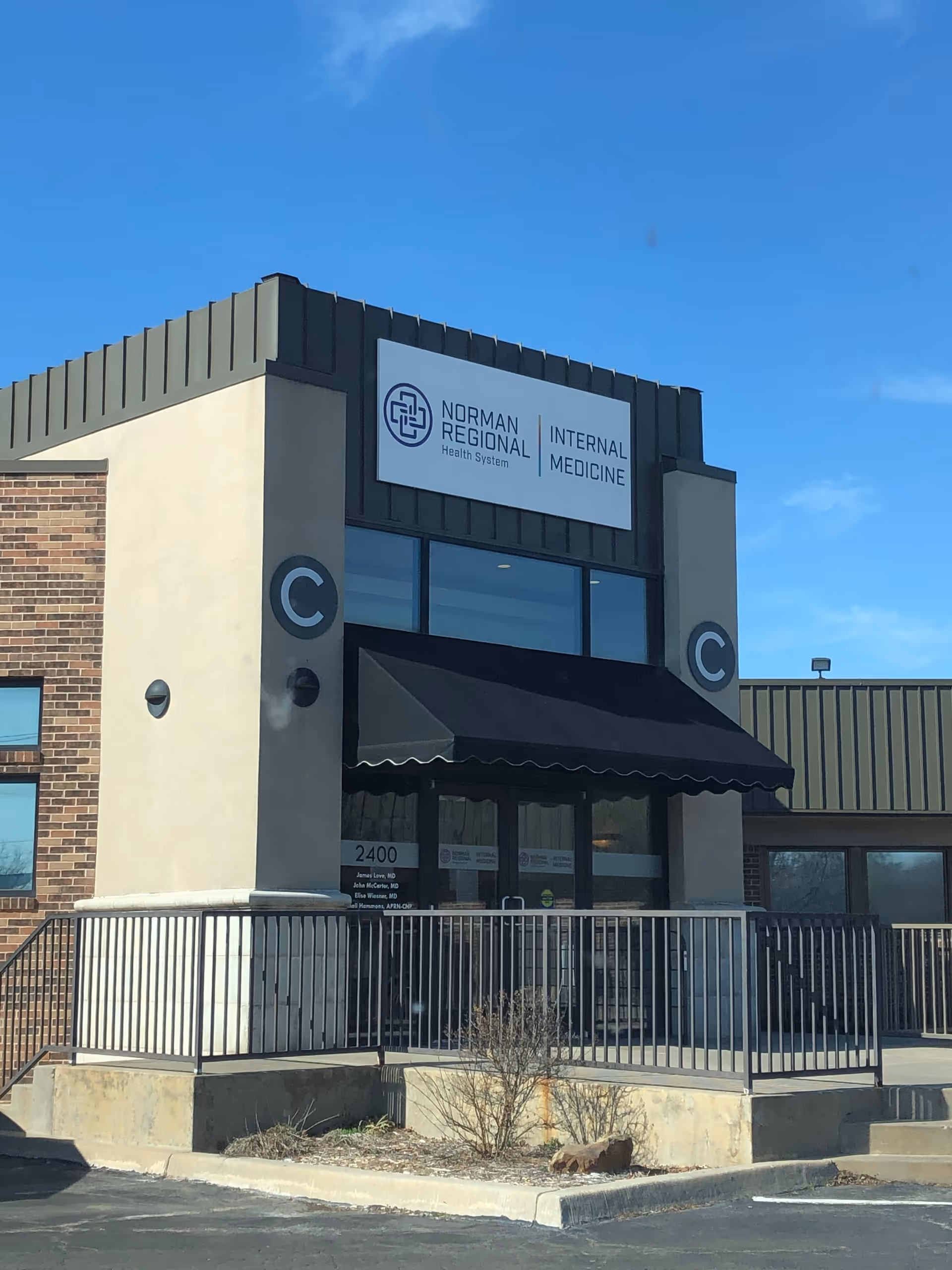 Facade of a medical clinic with Norman Regional Internal Medicine sign and entrance awning.