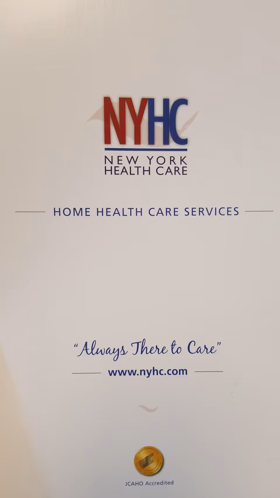 Interior wall with NYHC logo and Home Health Care Services branding.