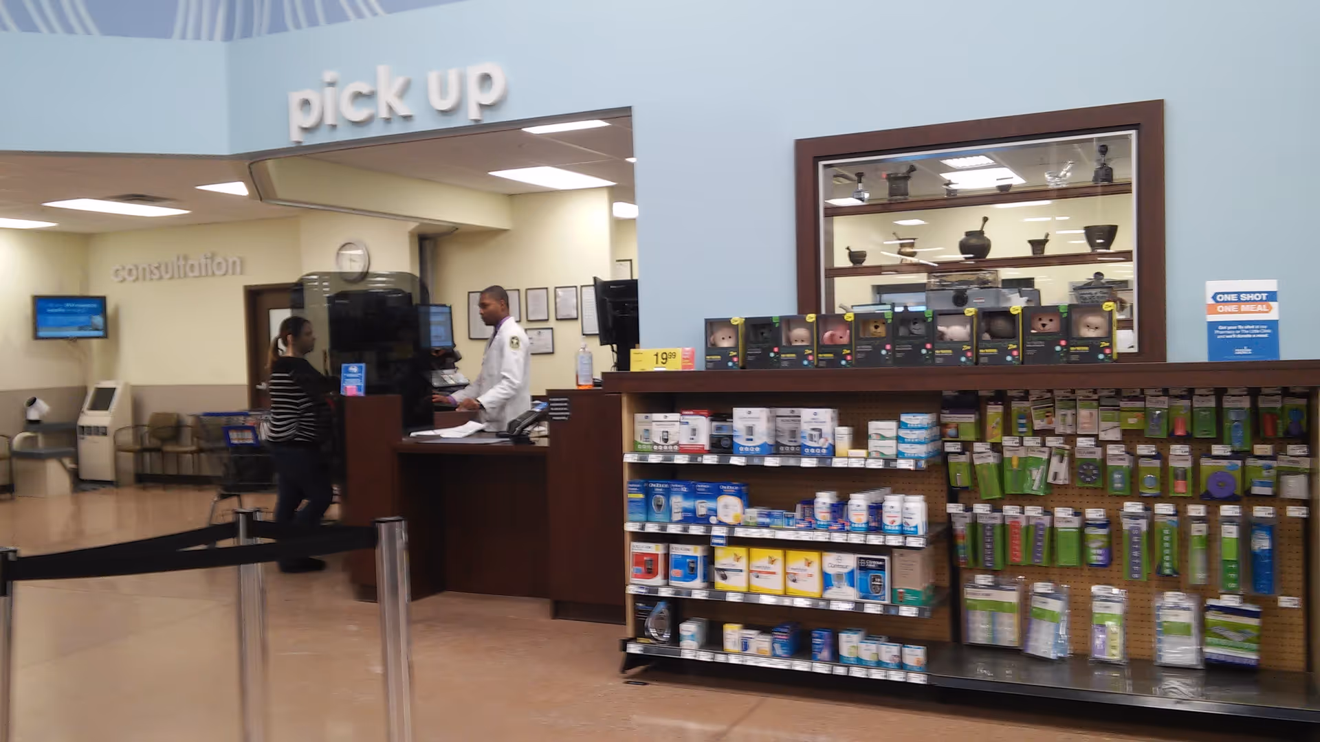Interior of Kroger Pharmacy in a senior living facility, featuring a counter and product shelves.