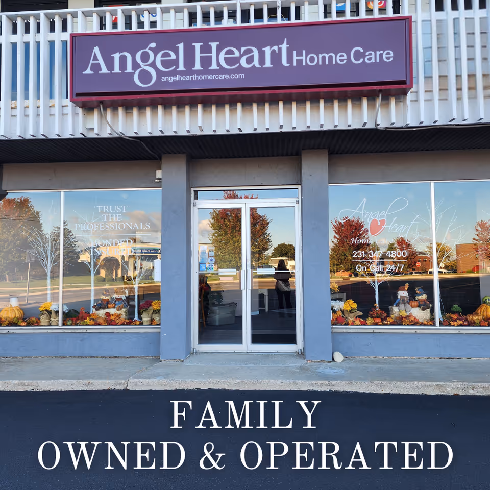 Front view of Angel Heart Home Care storefront with large sign and autumn decor.