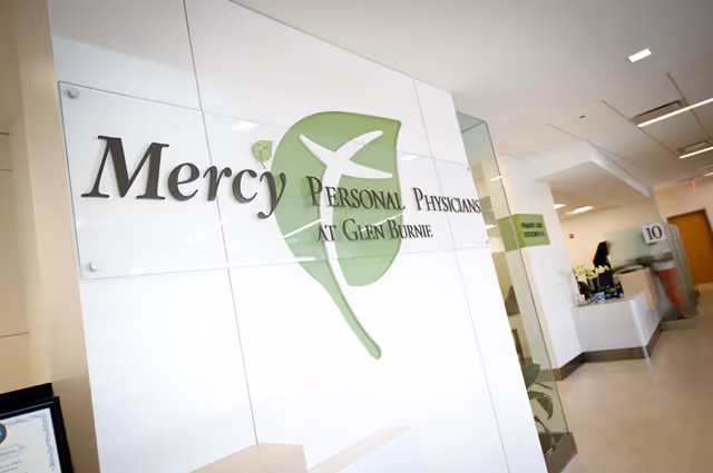 Interior lobby with Mercy Personal Physicians at Glen Burnie signage and a reception desk.