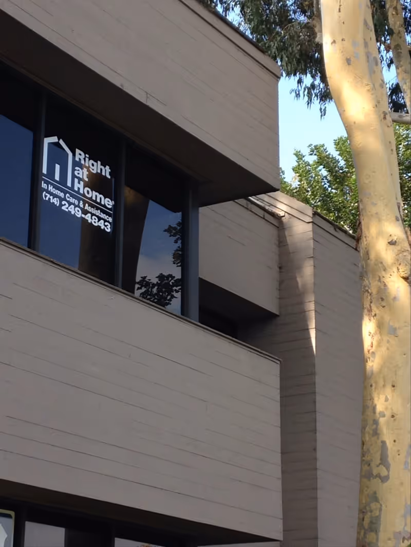 Exterior of a Right at Home building with window sign.
