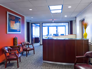 Reception area of Royal CareGivers with chairs and a front desk.