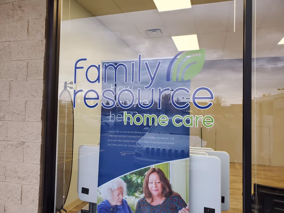 Storefront window displays 'Family Resource Home Care' sign and logo outside.