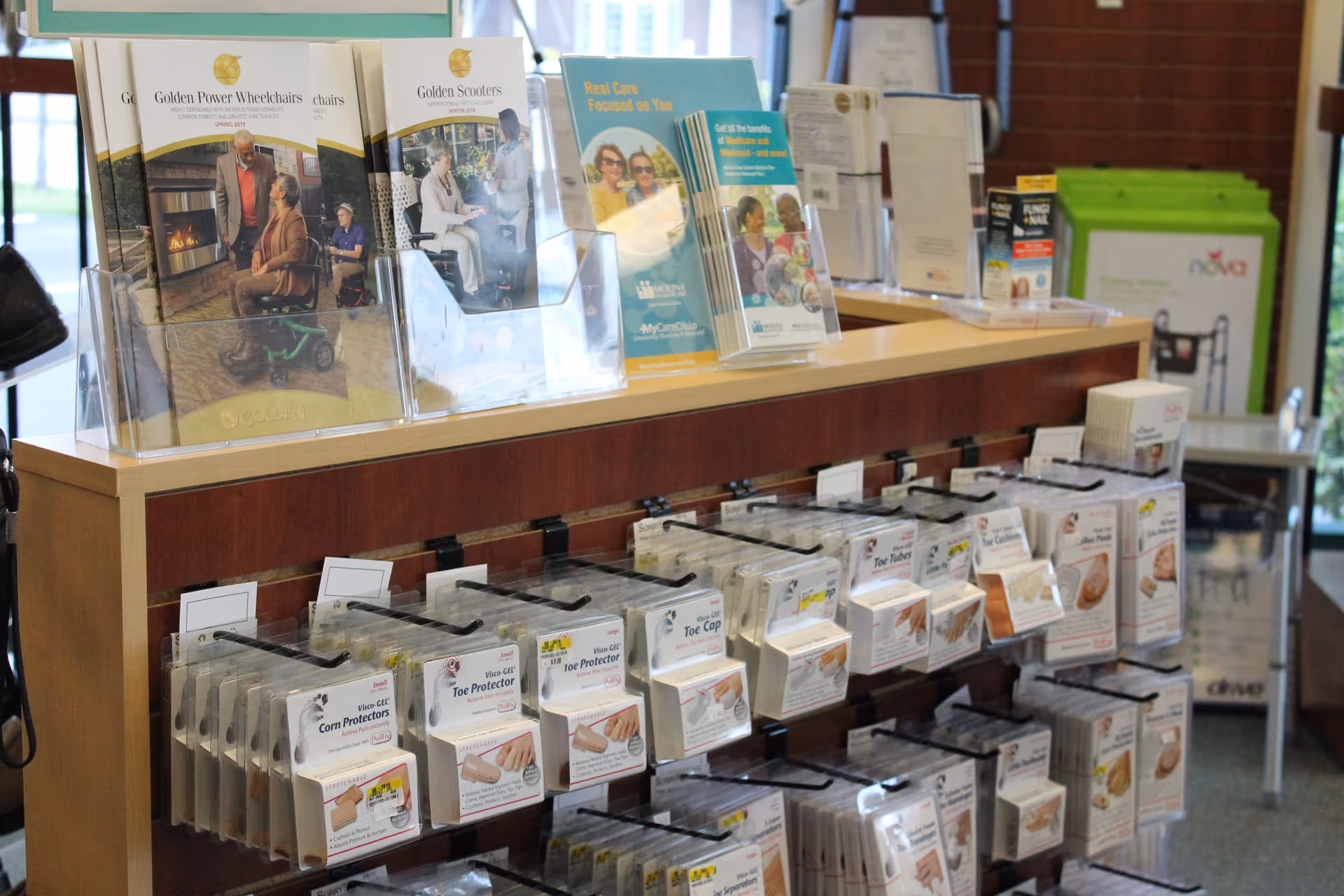 Interior lobby with brochure racks and medical supply products at Mullaney's.