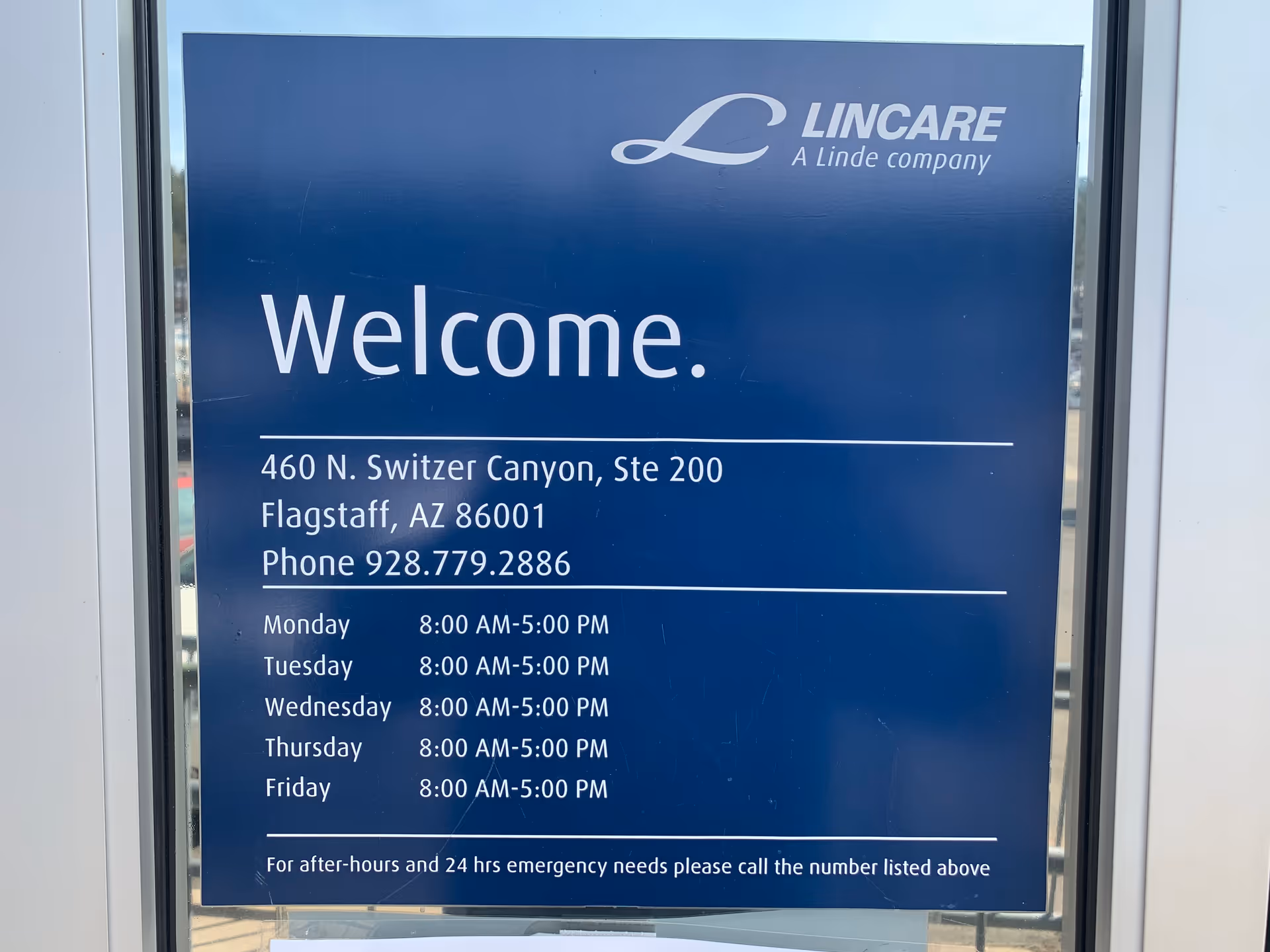 Blue LINCARE sign at entrance displaying Welcome, address, phone, and hours.