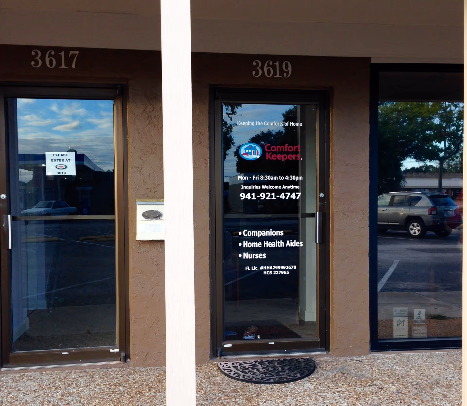 Entrance to Comfort Keepers Home Care with glass doors and address 3617-3619