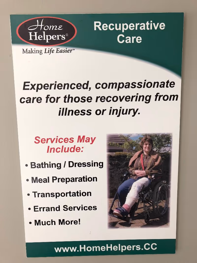 Poster on wall advertising Home Helpers recuperative care with a wheelchair user.