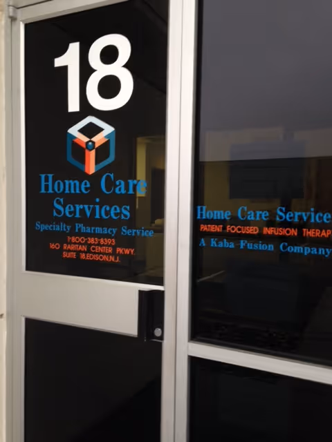 Glass doors show the number 18 and blue Home Care Services branding.