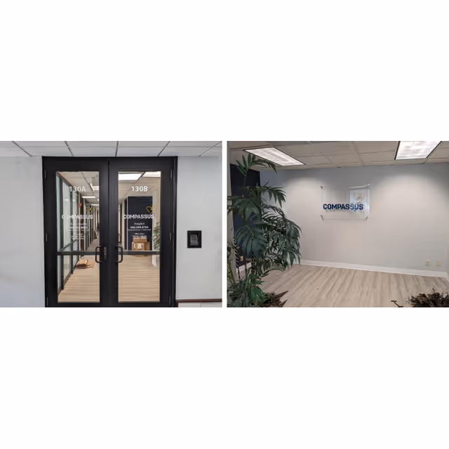 Double glass doors marked 130A/130B lead into a lobby with a Compassus sign.