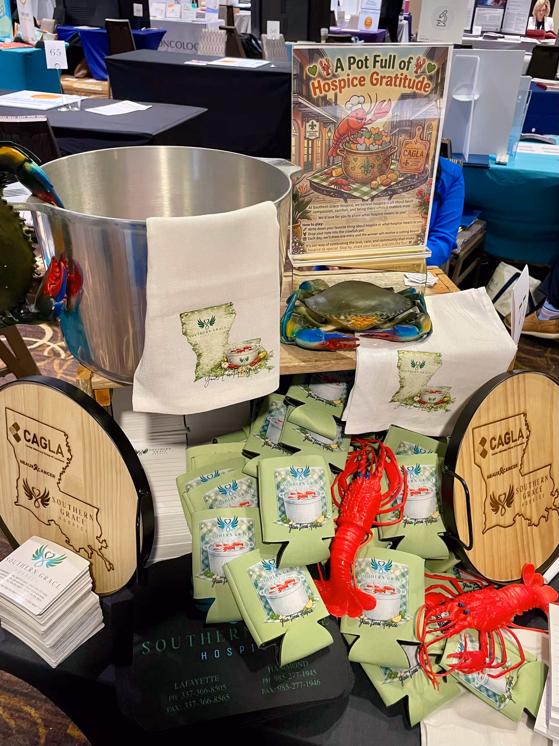 Trade show booth for Southern Grace Hospice displaying promotional materials and signage.
